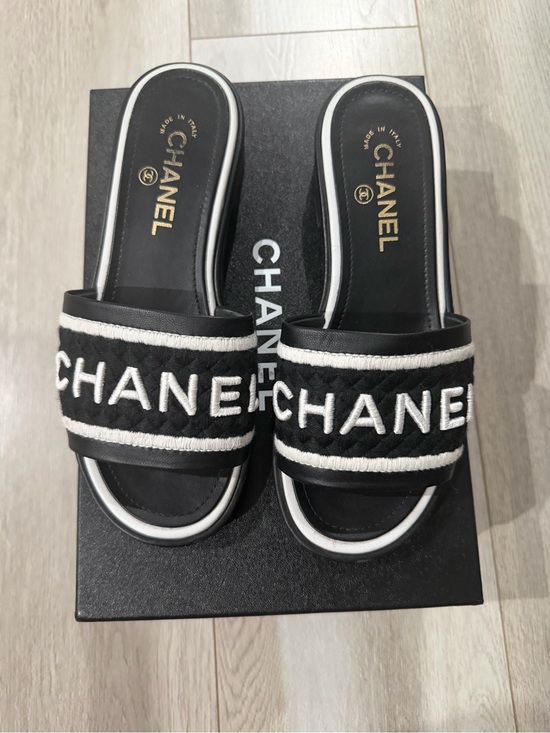 CHANEL Shoes - CHANEL Black & White Embroidered Logo Slide Sandals